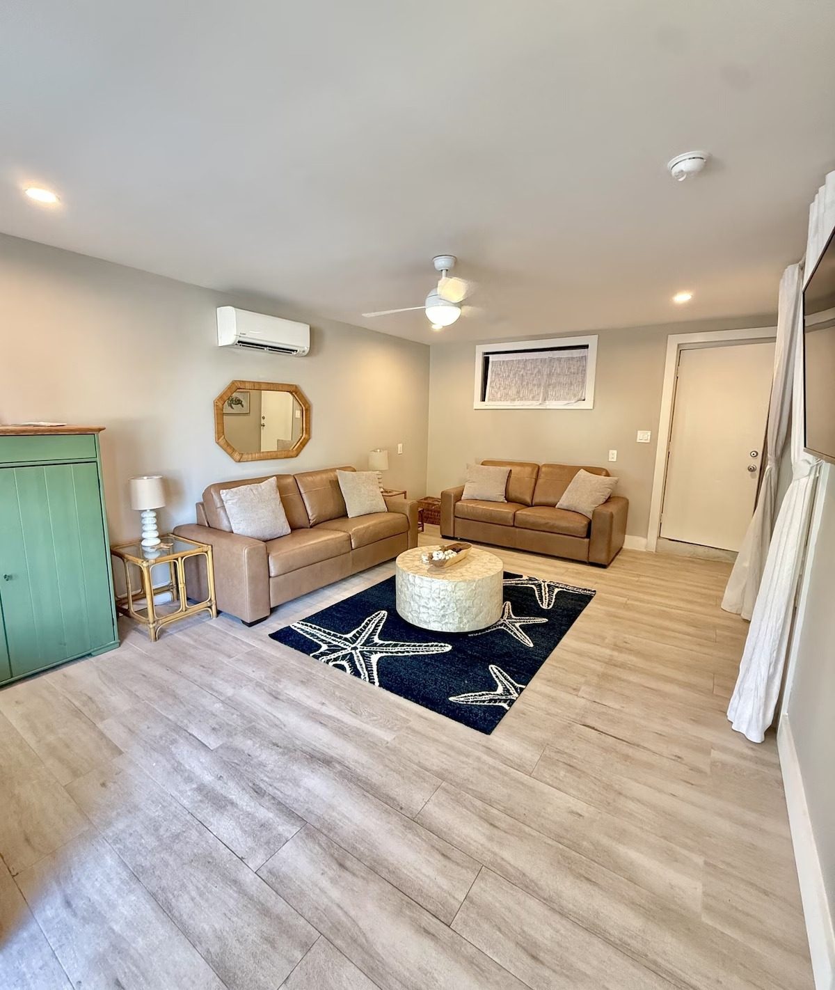 Ground floor sitting room with a sofa bed, sleeping space for two more guests