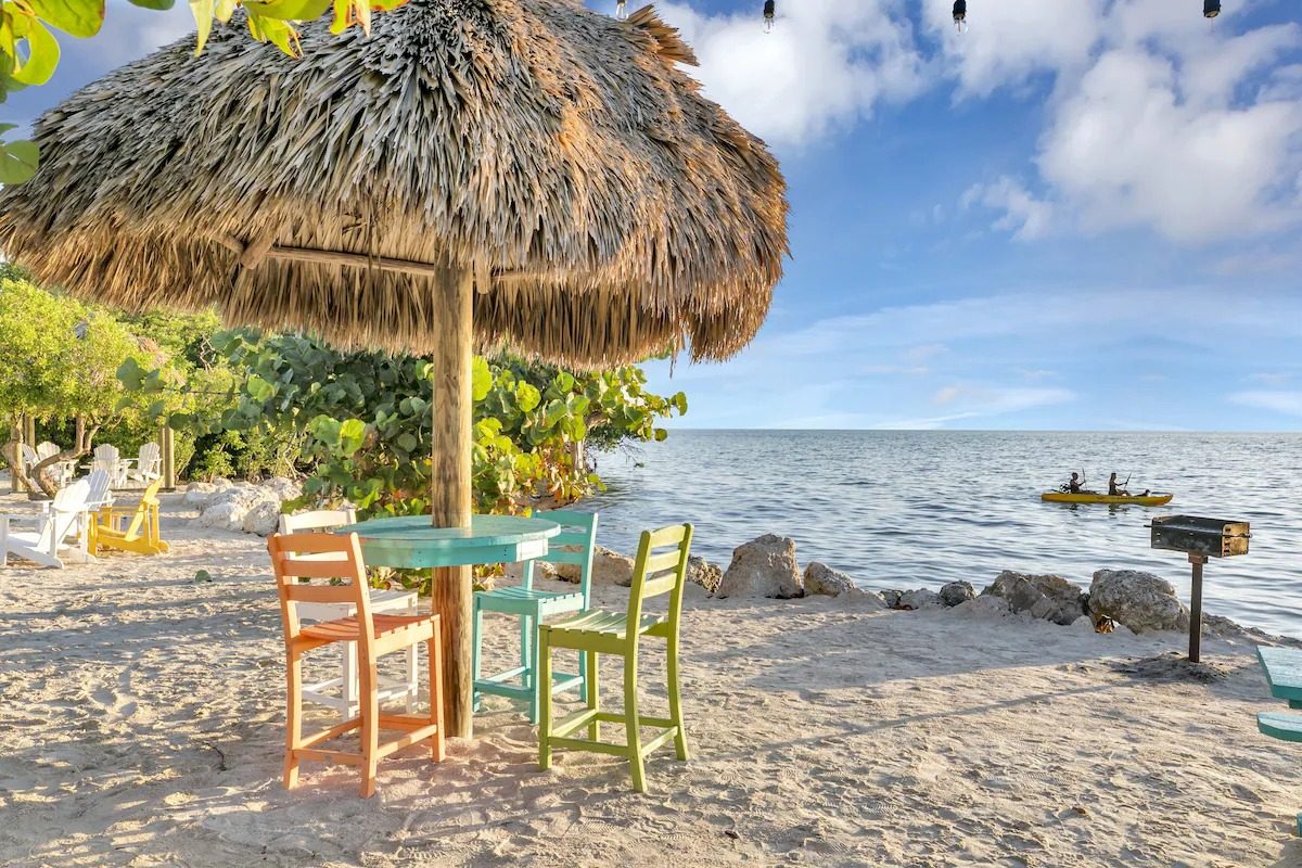 Private beach with tiki hut at a Key Largo vacation rental inside Kawama Yacht Club, looking out over the Atlantic